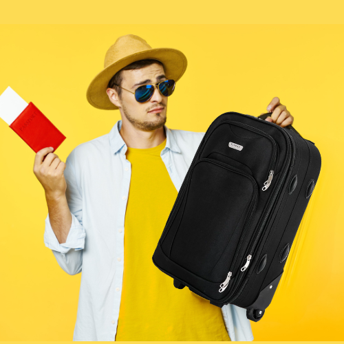 men holding a flymax suitcase ready to travel.
